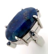 A Blue Sapphire 925 Silver Ring with Sapphire Accents. Weight - 19.60g. 65 carat large Madagascar