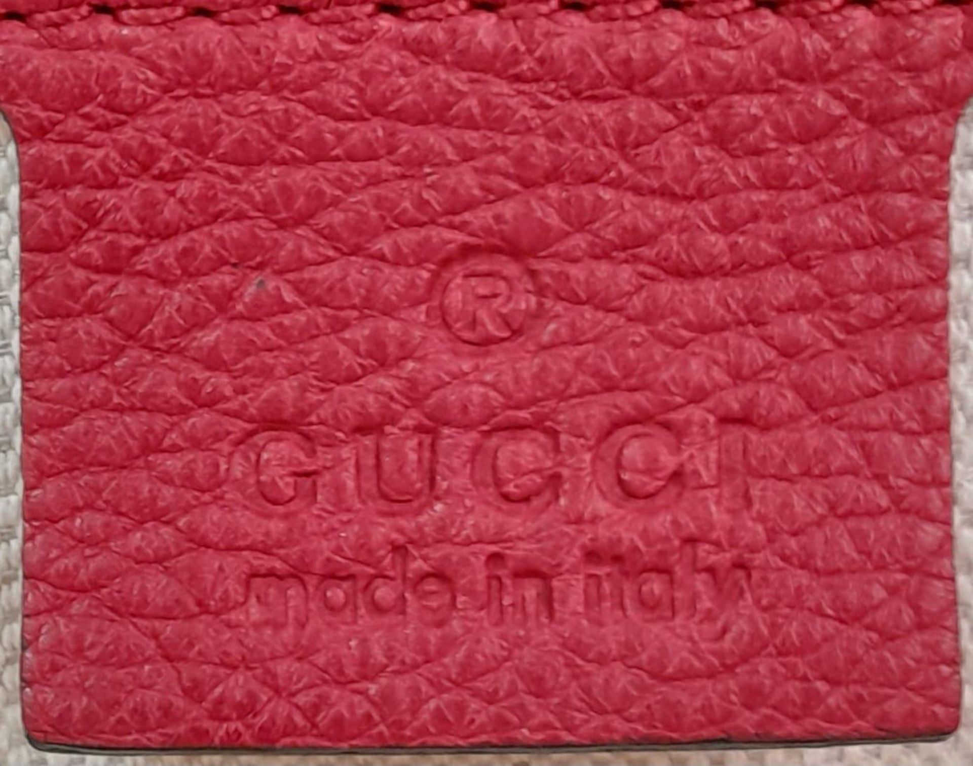 A Gucci Red Logo Shoulder Bag. Leather exterior with gold-toned hardware, adjustable strap and - Image 7 of 9