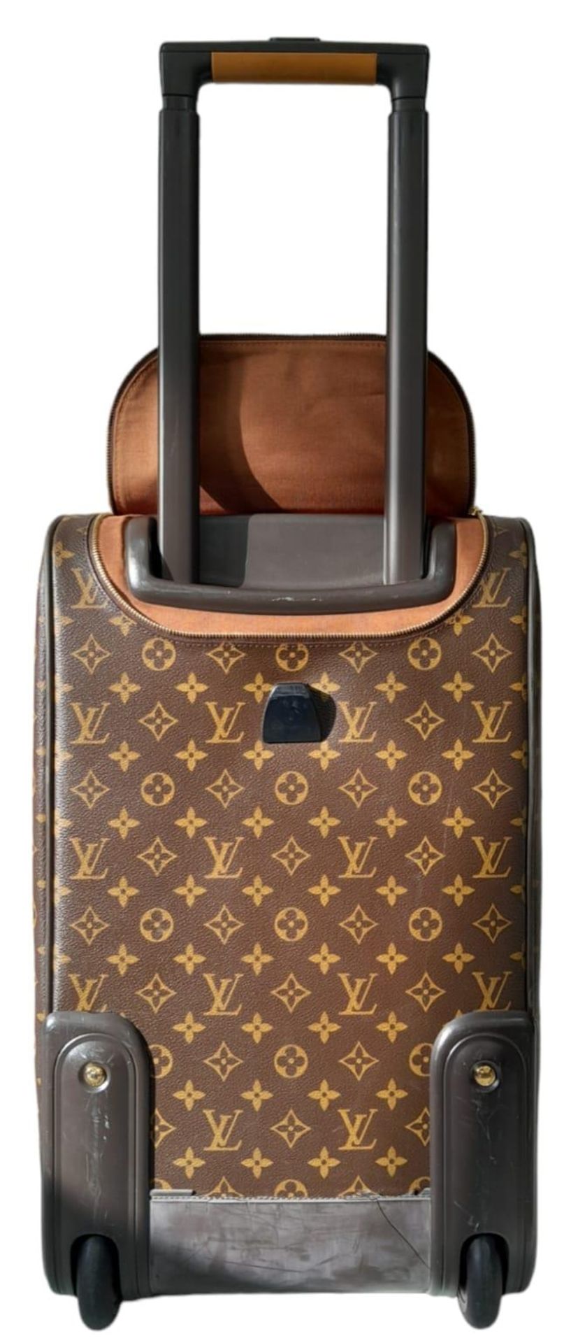 A Louis Vuitton Monogram Eole Convertible Travel Bag. Leather exterior with gold-toned hardware, - Image 7 of 11