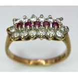 A Vintage 9K Yellow Gold Ruby and Diamond Ring. Five rubies with a twelve diamond surround. Size