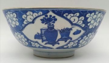 A LARGE CHINESE BLUE AND WHITE BOWL PAINTED WITH ANCIENT CHINESE FIGURES AND HAVING EXQUISITE