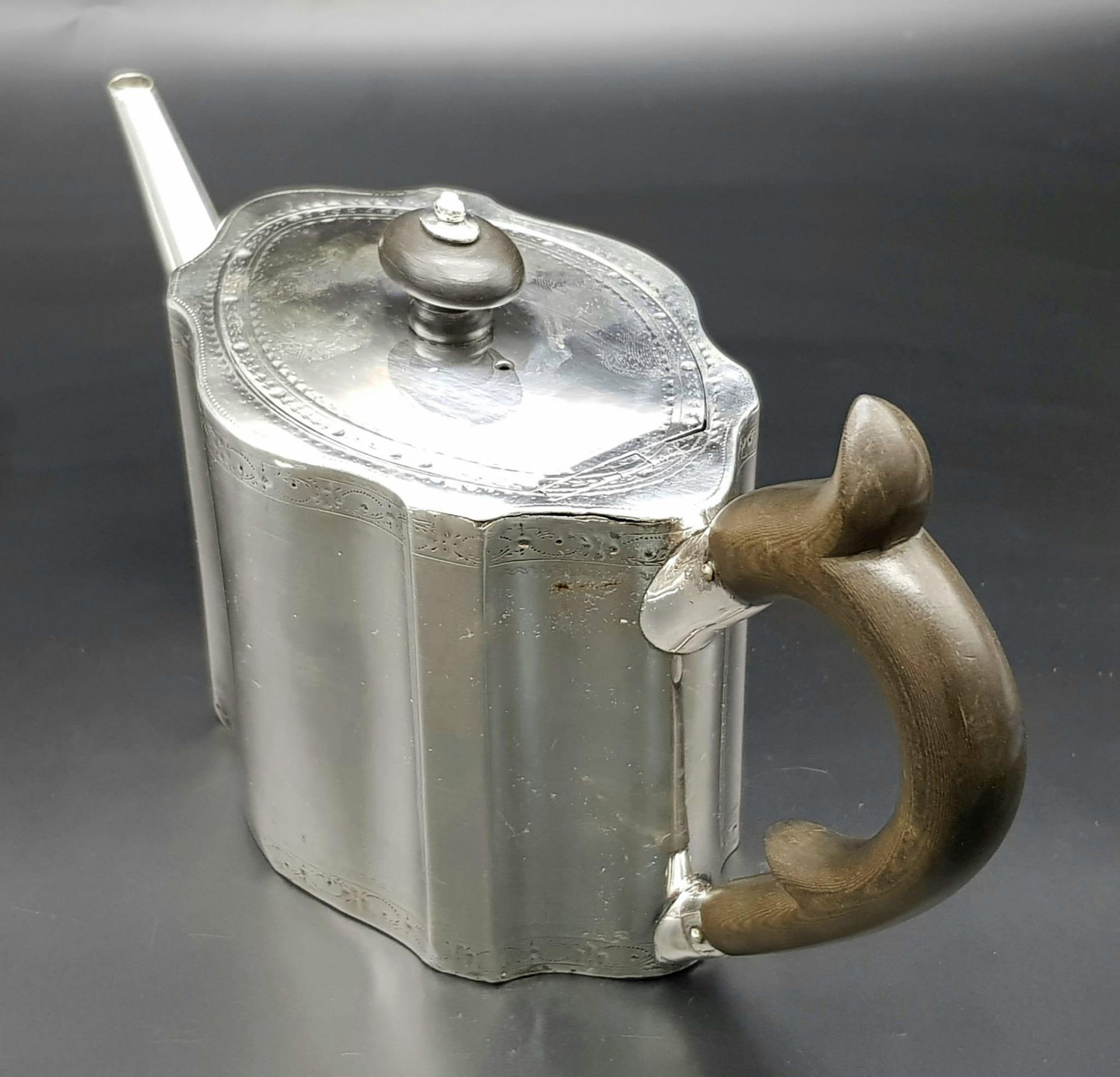 A 1785 Hester Bateman George III Silver Teapot. Oval form with empty cartouche to side. Minimalist - Image 5 of 11