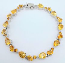 A Rich Citrine Gemstone Tennis Bracelet set in 925 Silver. 19cm length. Weight - 19 gm. Ref: HV-2166