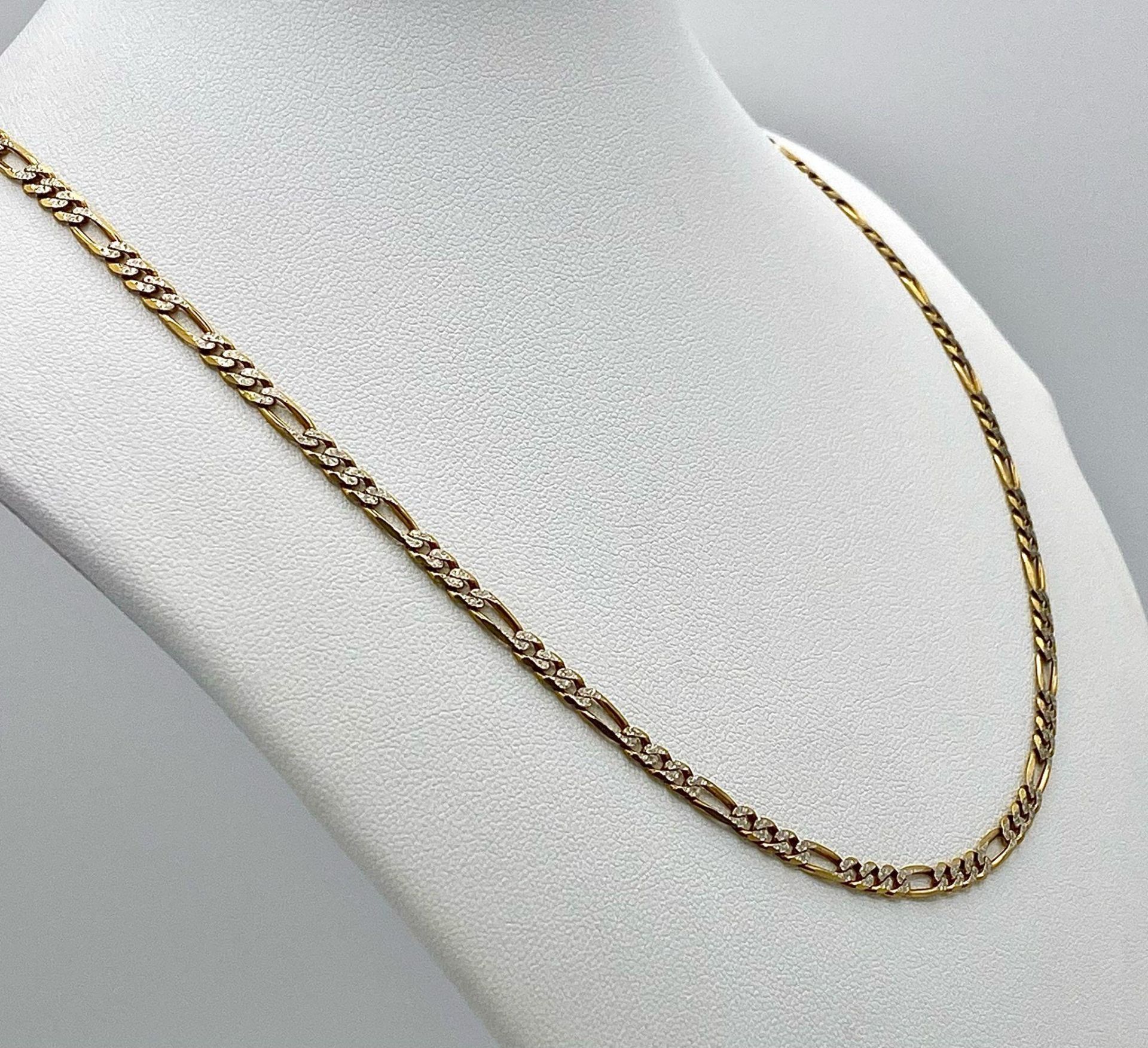 A 9K Yellow and White Gold Italian Figaro Link Necklace. 45cm length. 8.82g weight. - Image 2 of 7