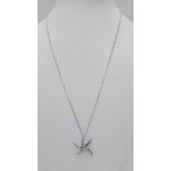 A New Sterling Silver White Topaz Set Starfish Pendant Necklace. Sterling Silver Pendant Measures