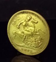 An 1895 Queen Victoria 22K Gold Half Sovereign.