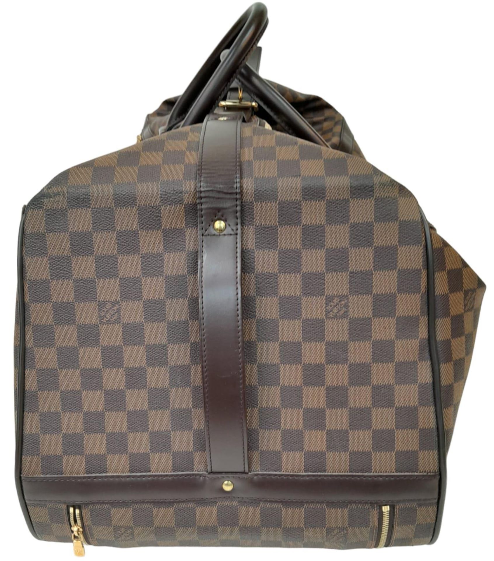 A Louis Vuitton Damier Ebene Eole Convertible Travel Bag. Leather exterior with gold-toned hardware, - Image 4 of 10