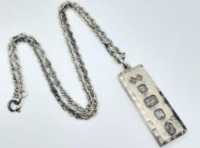 A vintage Victorian sterling silver ingot pendant on silver chain. Full hallmark London, 1977. Total