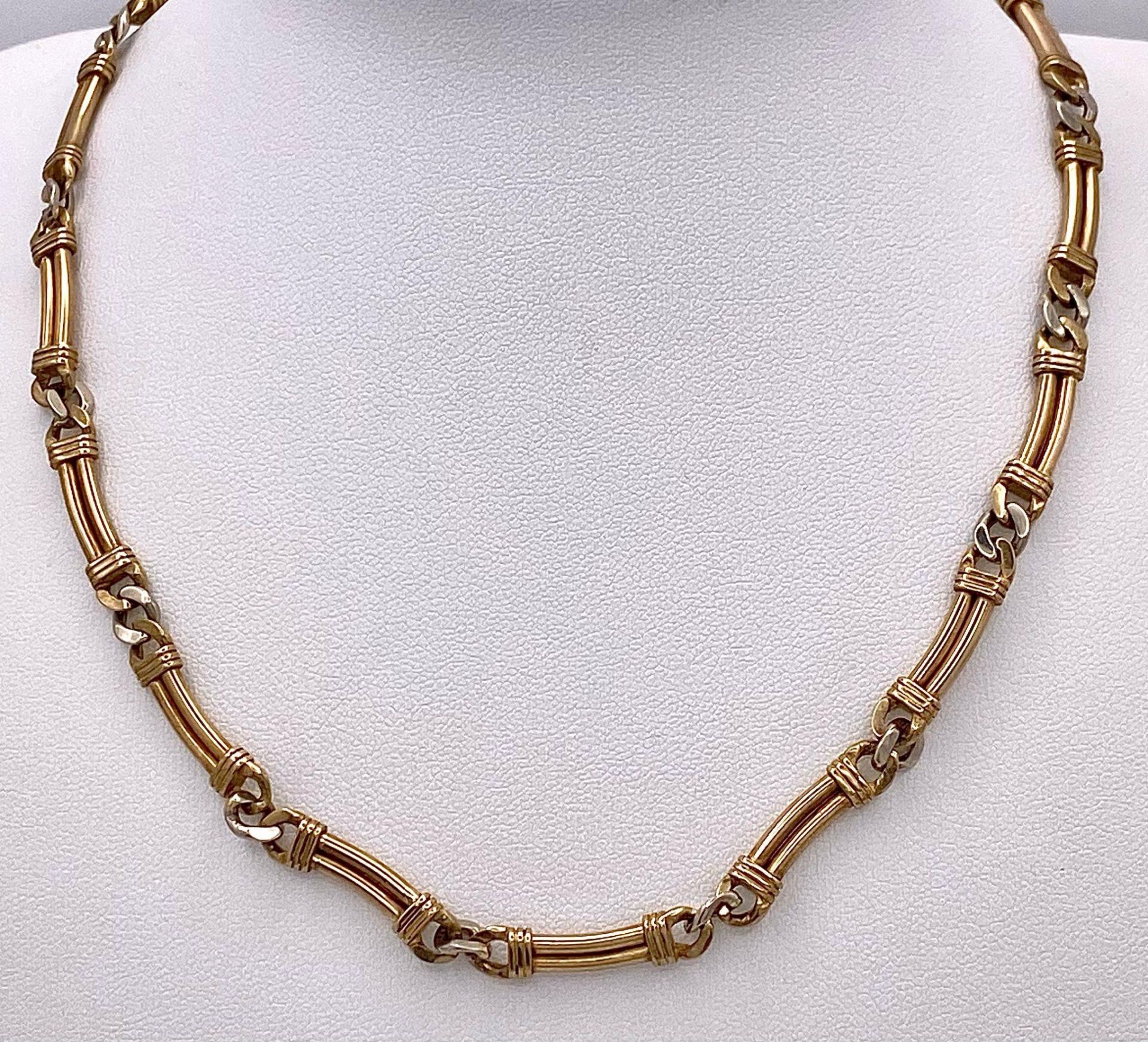 A Vintage 9K Yellow Gold Double Bar Necklace with Curb Spacers. 40cm. 21.2g weight.