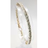 An Annina Vogel Diamond Tennis Bracelet. A wonderful mix of platinum and diamonds with part of an