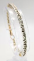 An Annina Vogel Diamond Tennis Bracelet. A wonderful mix of platinum and diamonds with part of an