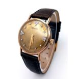 A BULOVA MID SIZE GOLD PLATED MANUAL WIND WATCH WITH DIAMOND NUMERALS AND GOLD TONE DIAL . 32mm