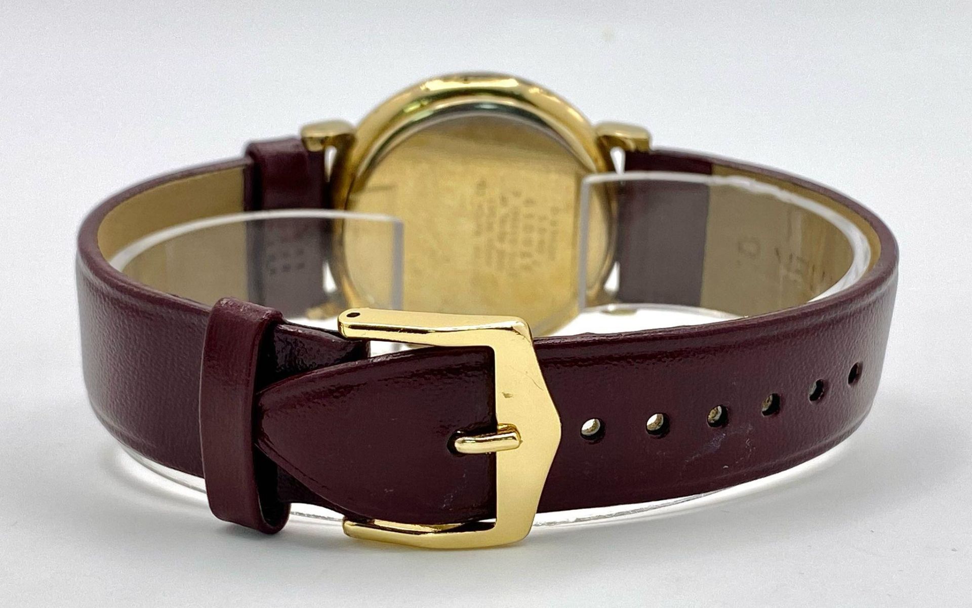 A Citizen Quartz Moonphase Unisex Watch. Burgundy leather strap. Gilded case - 33mm. In working - Image 4 of 7