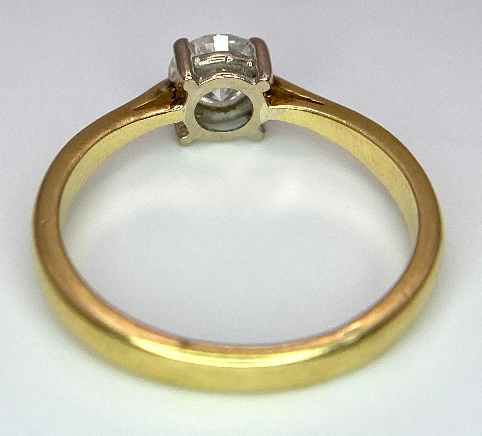 An 18K Yellow Gold Diamond Solitaire Ring. Brilliant round cut - 0.45ctw. 2.5g total weight. Size L. - Image 6 of 7