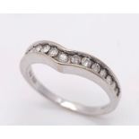 An 18K White Gold Diamond Chevron Ring. 0.35ctw. Size O. 3.4g total weight.
