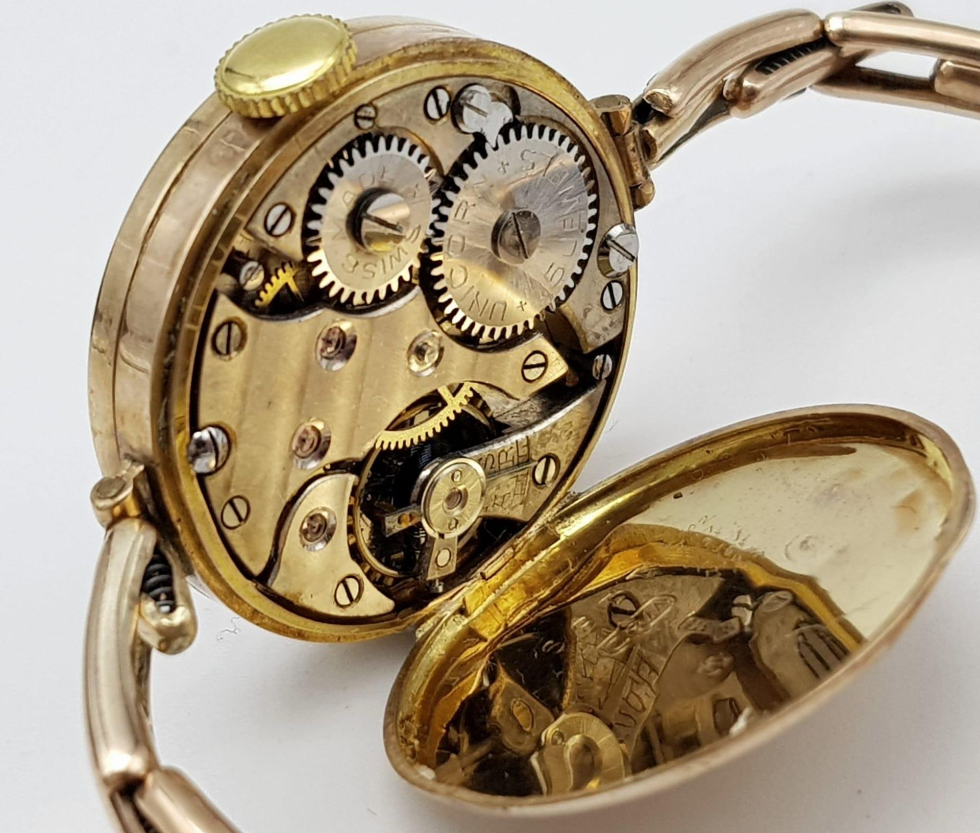 An antique, 9 K rose gold UNICORN watch with spring loaded adjustable bracelet. Swiss made, 15 - Bild 3 aus 8