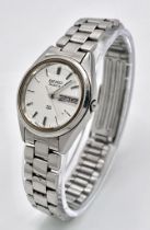 A Vintage Seiko SQ Quartz Day Date Ladies Watch, Stainless Steel, 25mm diameter, Fits Wrist Size