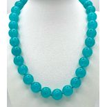 A Beautiful Blue Chalcedony 14mm Bead Necklace. 44cm length.