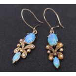 A vintage, 9 K yellow gold pair of drop earrings with opals and seed pearls. height: 24 mm,