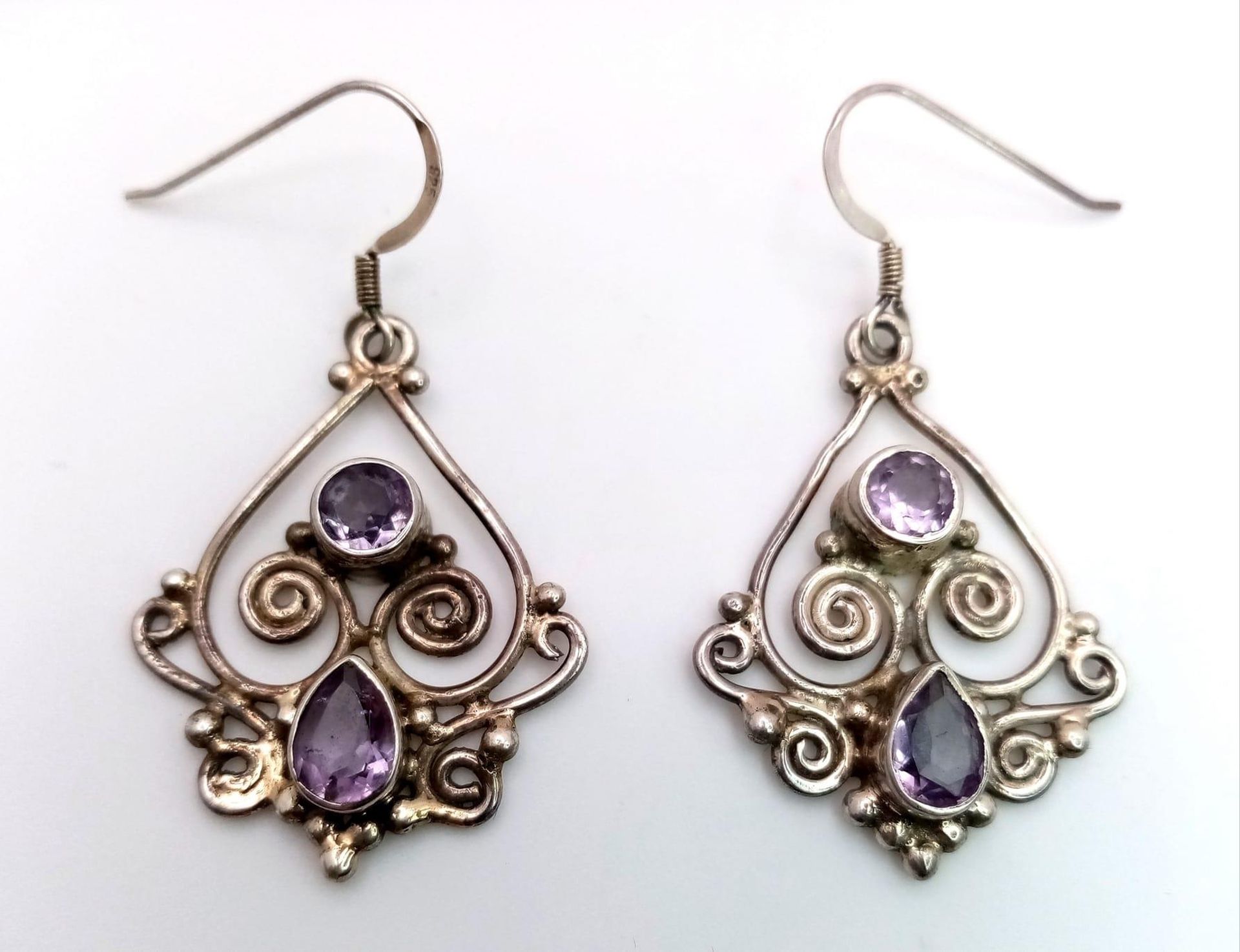 A Pair of Art Deco Style 925 Silver Amethyst Gemstone Earrings. 3cm. Weight - 7.20g. Comes in a