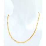 A VERY ATTRACTIVE AND UNUSUAL 9K GOLD PATTERENED BAR LINKED NECK CHAIN . 9.6gms 44cms