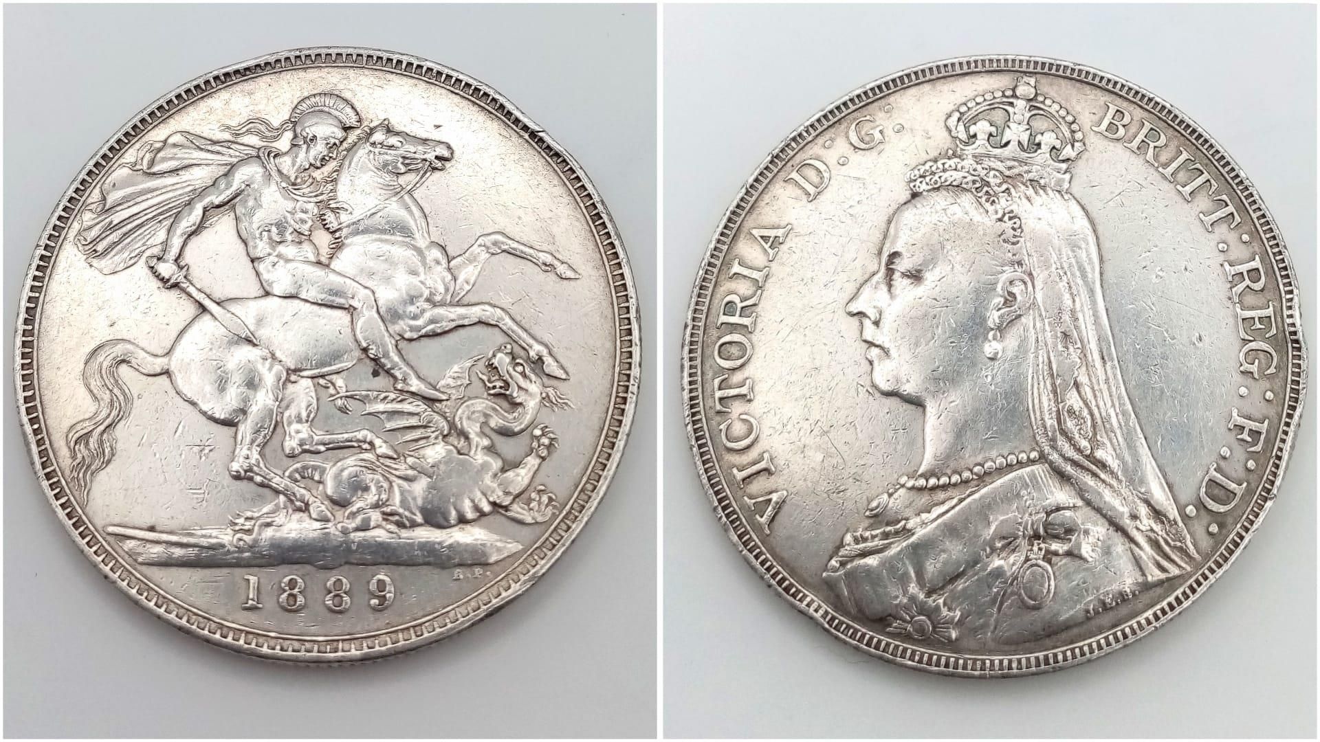 An 1889 Queen Victoria Silver Crown Coin. VF grade but please see photos.