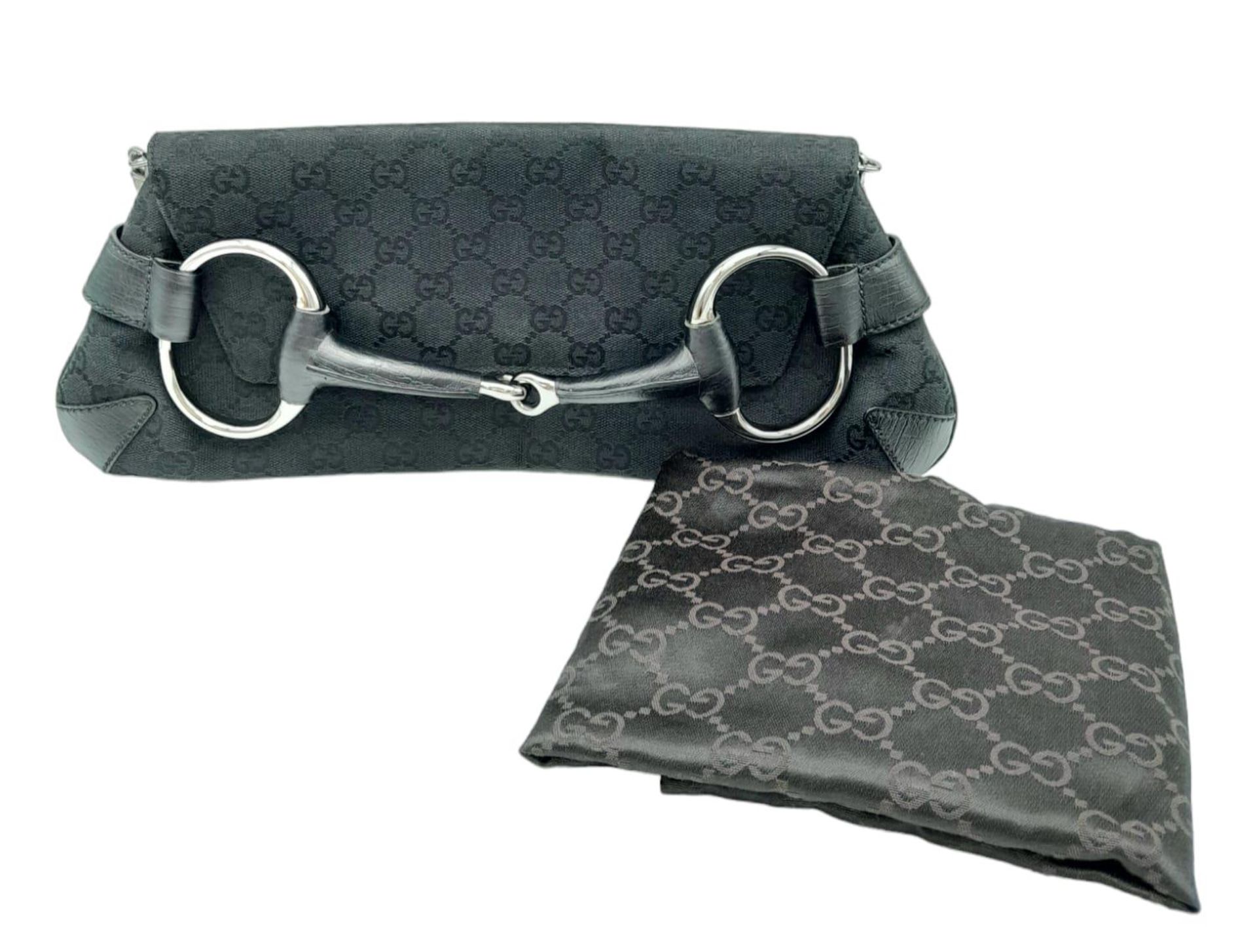 A Gucci GG black canvas bag featuring the black and gunmetal grey horsebit and metal shoulder strap. - Bild 3 aus 6