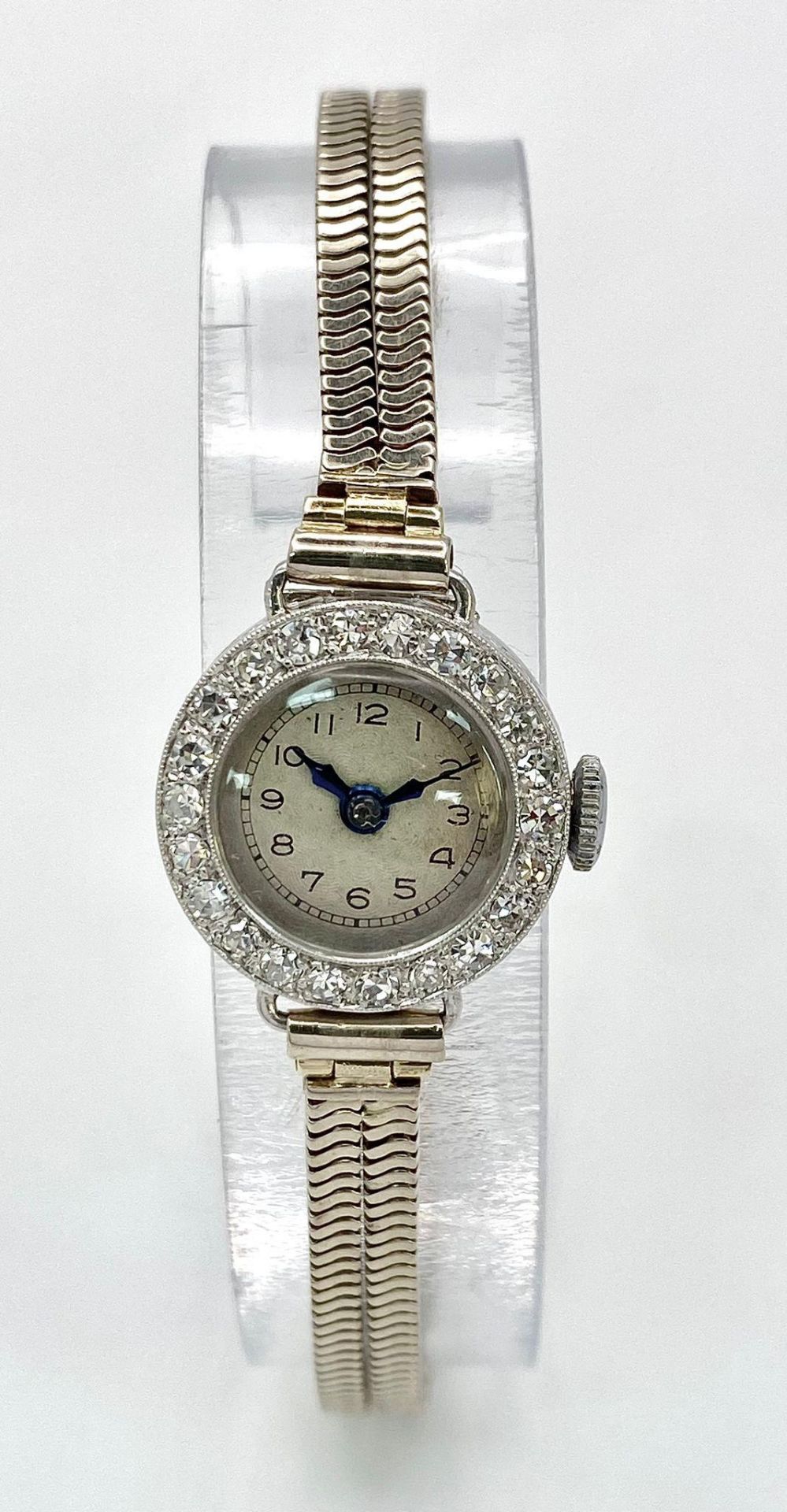 A ladies, platinum watch with diamond bezel and a 9 K white gold double snake chain bracelet. The - Image 2 of 6