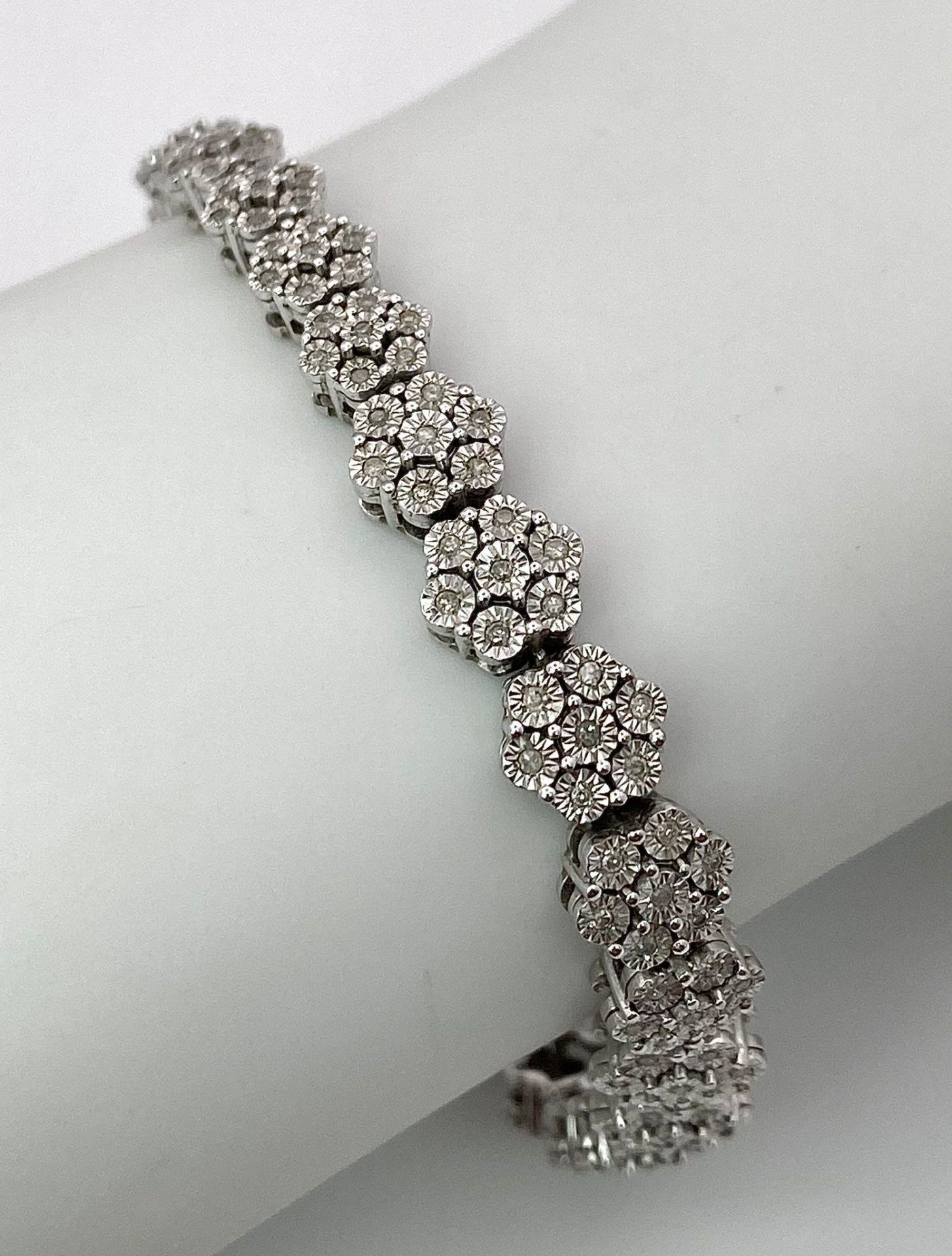 A 9K White Gold Graduated Link Diamond Tennis Bracelet. 29 links of seven small diamonds - 203 - Image 6 of 9