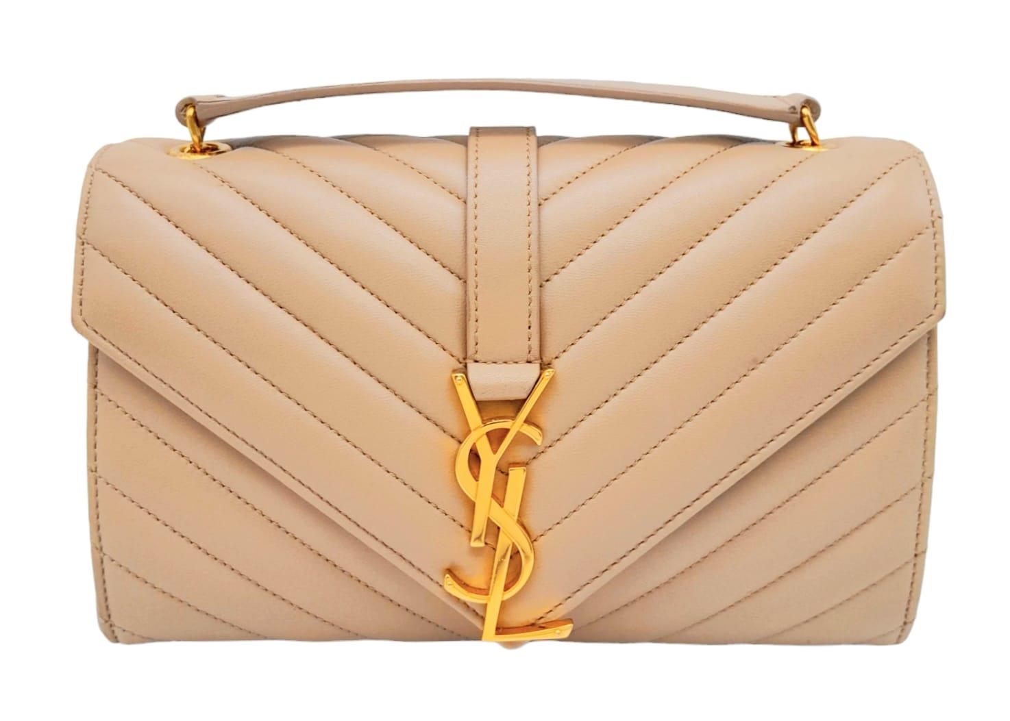 A Saint Laurent envelope shoulder bag, soft beige calfskin with gold hardware and strap, press - Image 2 of 11