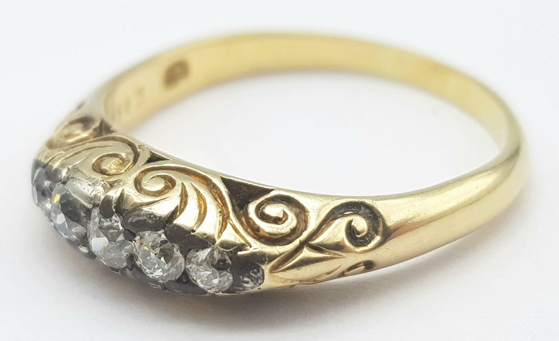 An 18K Yellow Gold Diamond Gypsy Ring. 0.15ctw diamonds. Size P. 4.9g total weight. - Image 2 of 5
