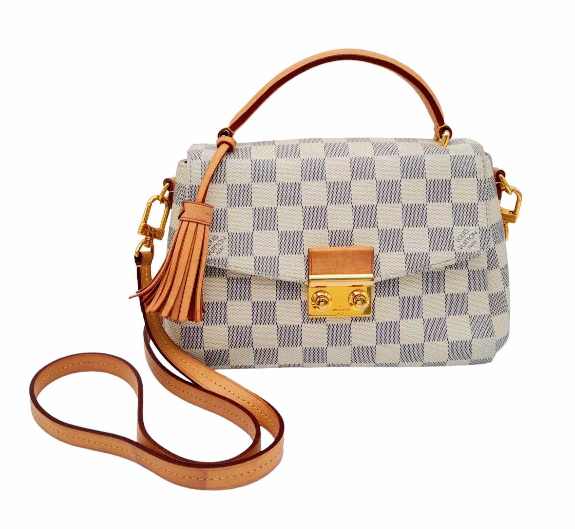 A Louis Vuitton damier canvas Croisette handbag in cream/blue, interior is baby pink. Leather handle