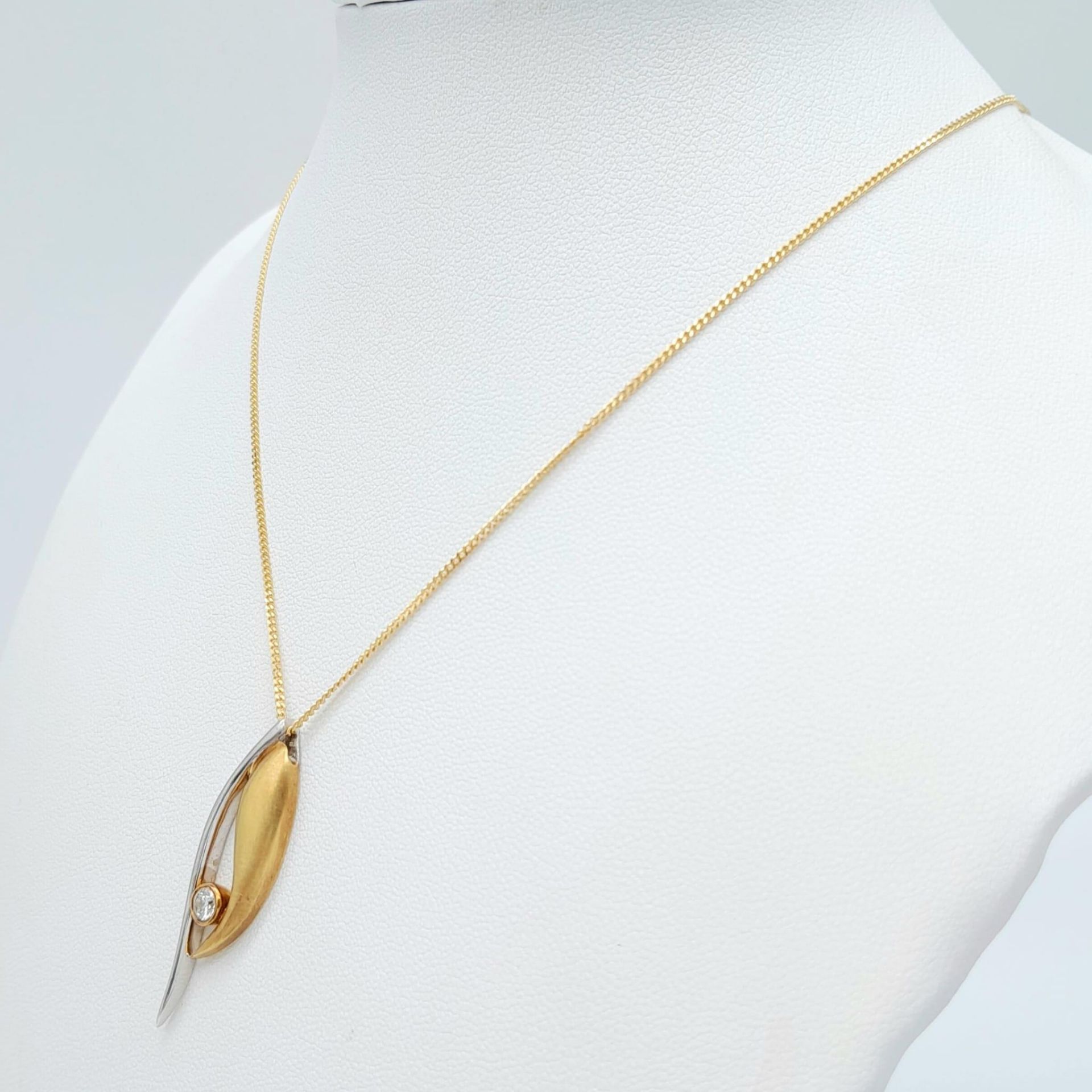 An 18K Bi Colour Gold Diamond Pendant on an 18K Yellow Gold Disappearing Necklace. 0.15ct diamond. - Image 2 of 11