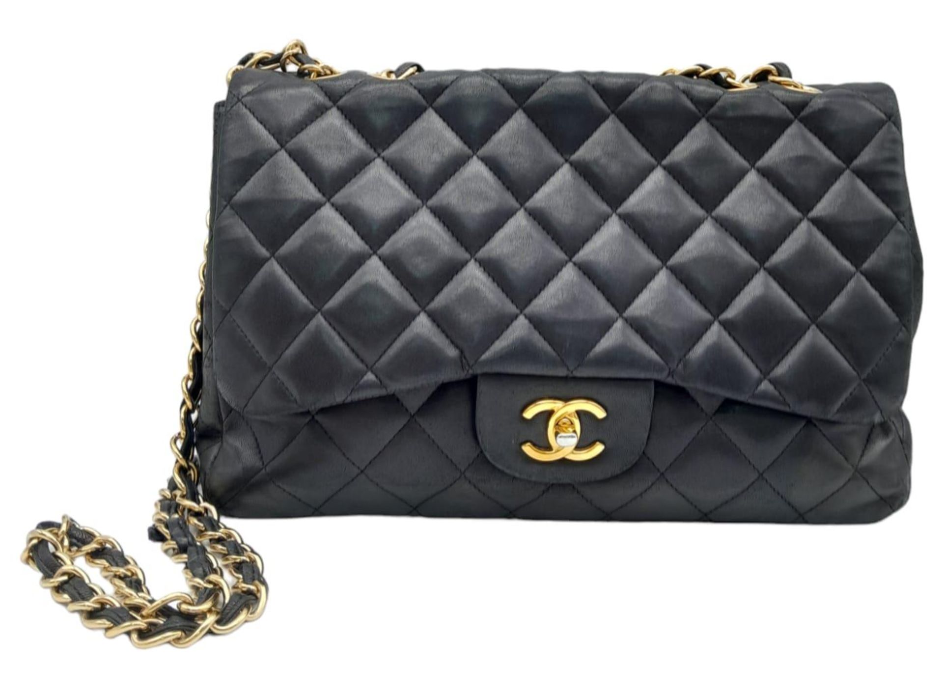 A Chanel Black Caviar Classic Single Flap Bag. Quilted pebbled leather exterior with gold-toned