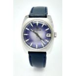 A Vintage Rodania Mechanical Gents Watch. Blue leather strap. Stainless steel case - 32mm. Purple