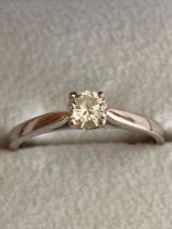 18 carat WHITE GOLD and DIAMOND SOLITAIRE RING. Having a 0.33 (1/3) carat DIAMOND Mounted to top.