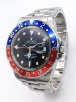 A Rolex GMT Master 16750 Automatic Gents Watch. Stainless steel bracelet and case - 40mm. 'Pepsi