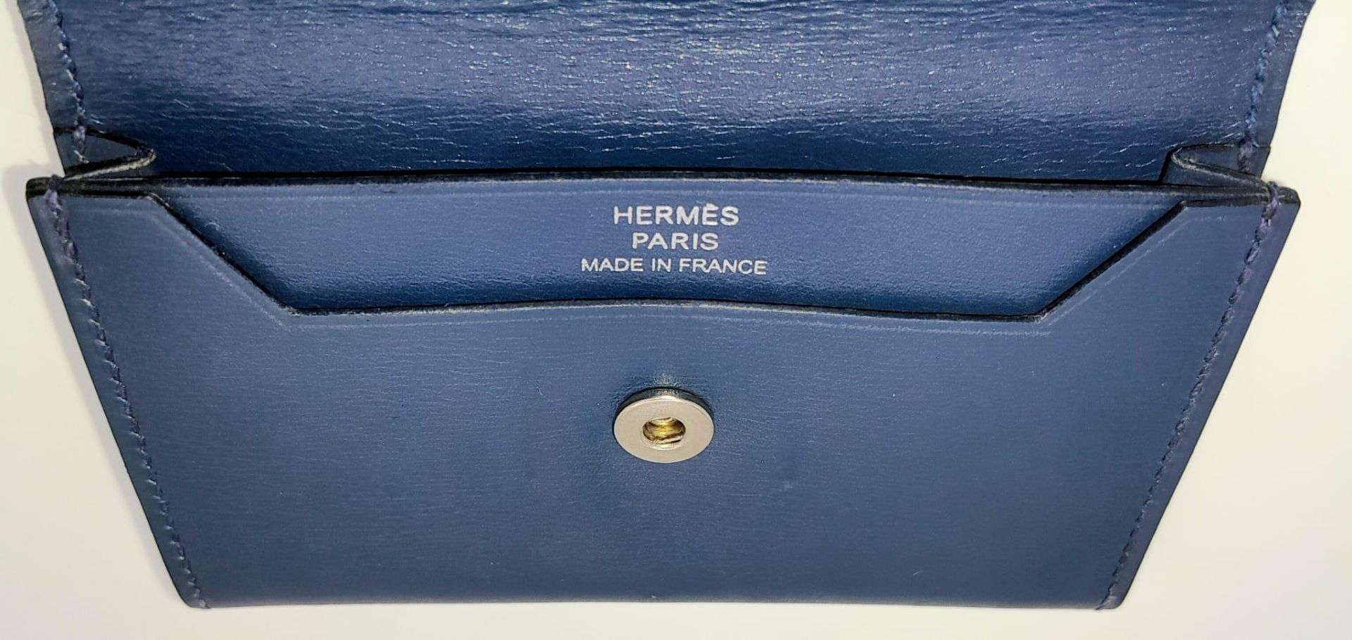 A Small Blue Leather Hermes Ladies Wallet. Flap design with Letter H branding. In good condition but - Image 6 of 7