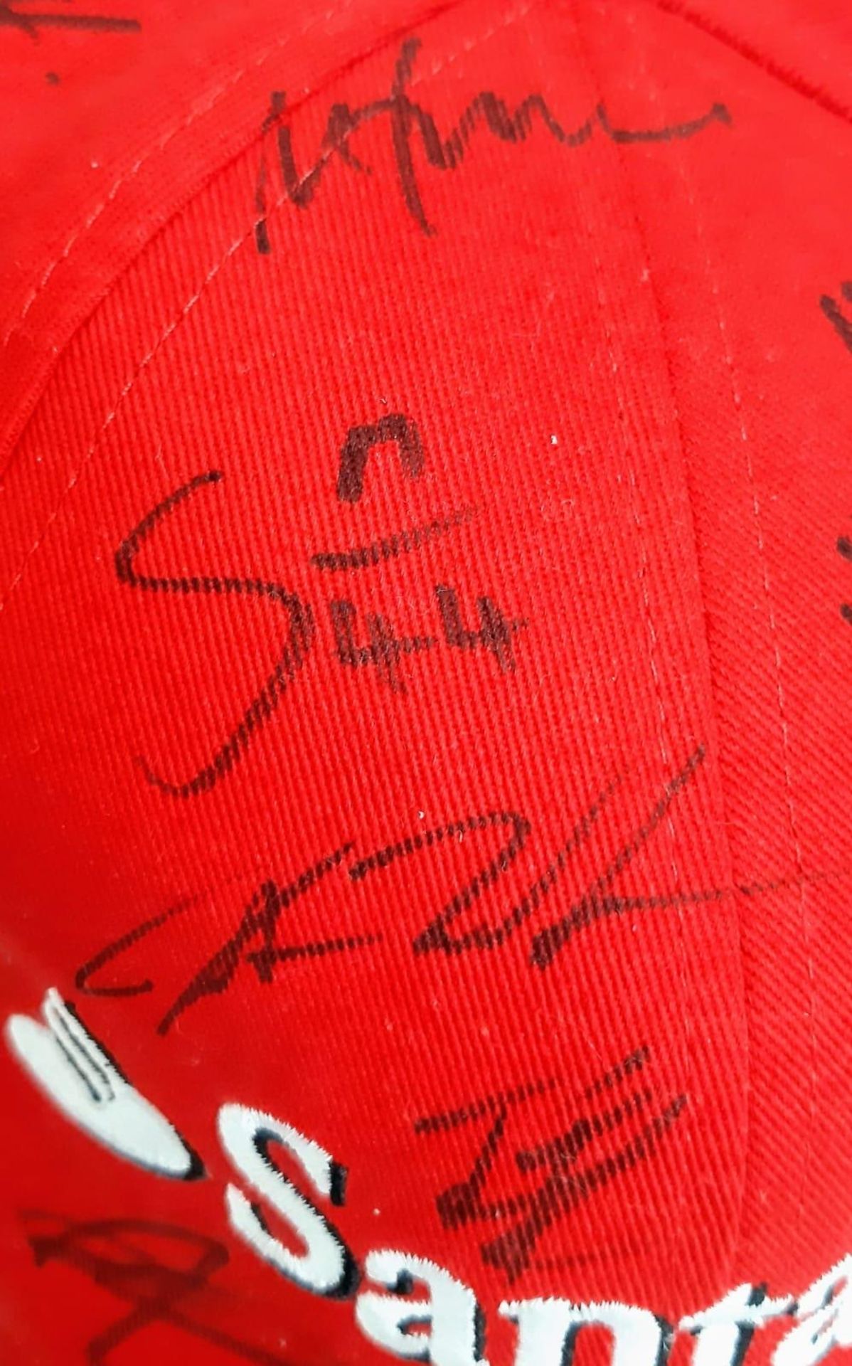 An Official Ferrari Team Cap - Over 20 signatures including Ferrari drivers and team principals. - Image 14 of 14