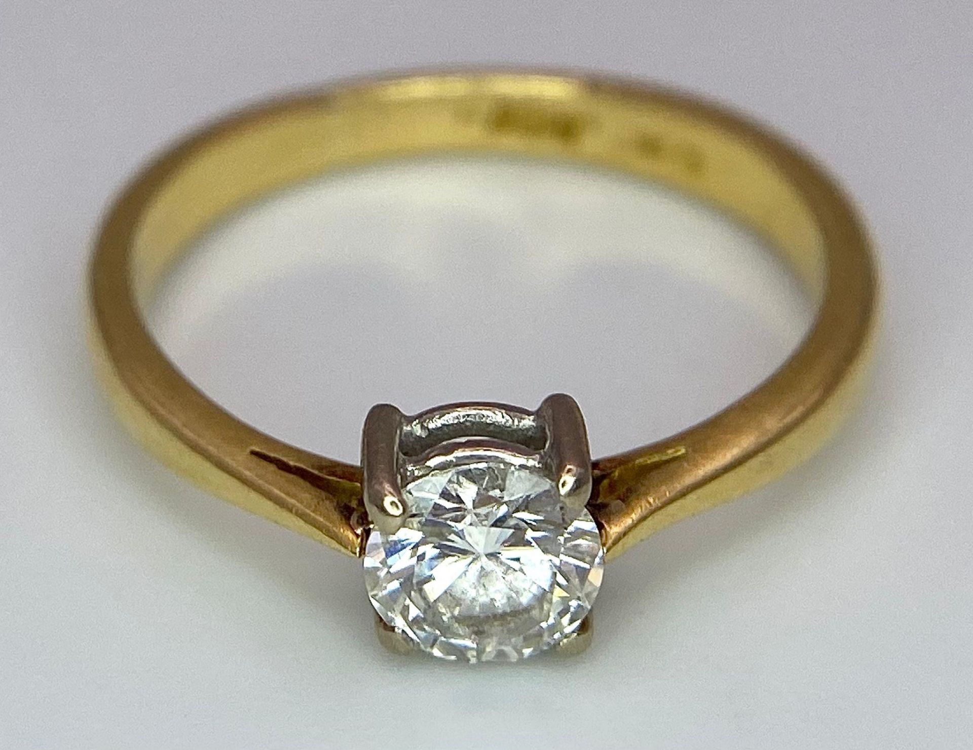 An 18K Yellow Gold Diamond Solitaire Ring. Brilliant round cut - 0.45ctw. 2.5g total weight. Size L. - Image 5 of 7