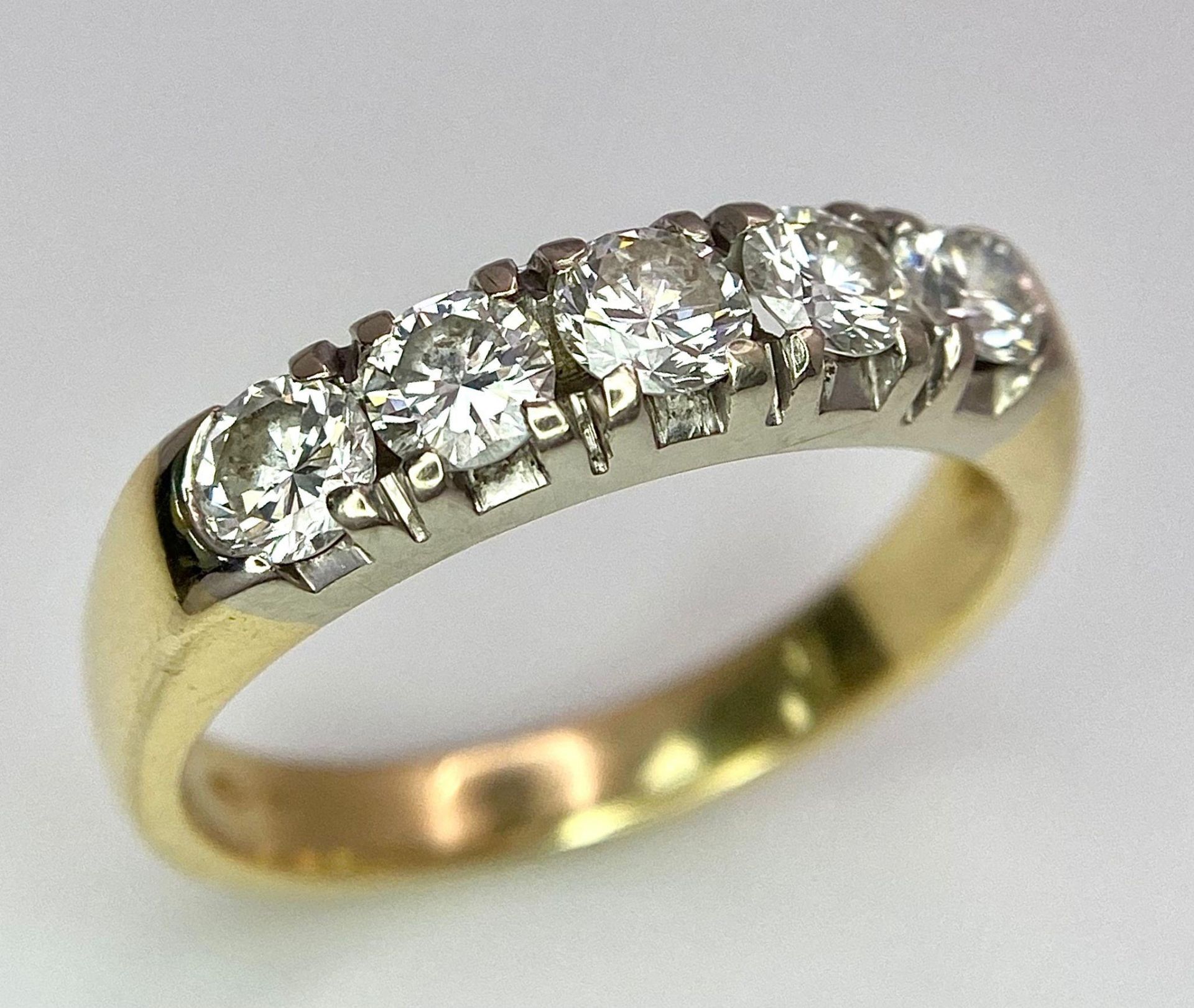 An 18K Yellow Gold Five Stone Diamond Ring. 0.85ctw of brilliant round cut diamonds. Size L. 3.6g - Bild 2 aus 8