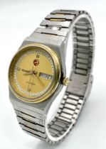 A Vintage Rado Voyager Automatic Unisex Watch. Stainless steel bracelet and case - 33mm. Gilded dial