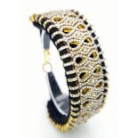 A Brilliantly Unique Handcrafted Designer Diamond Bracelet. A black woven textile bracelet strap