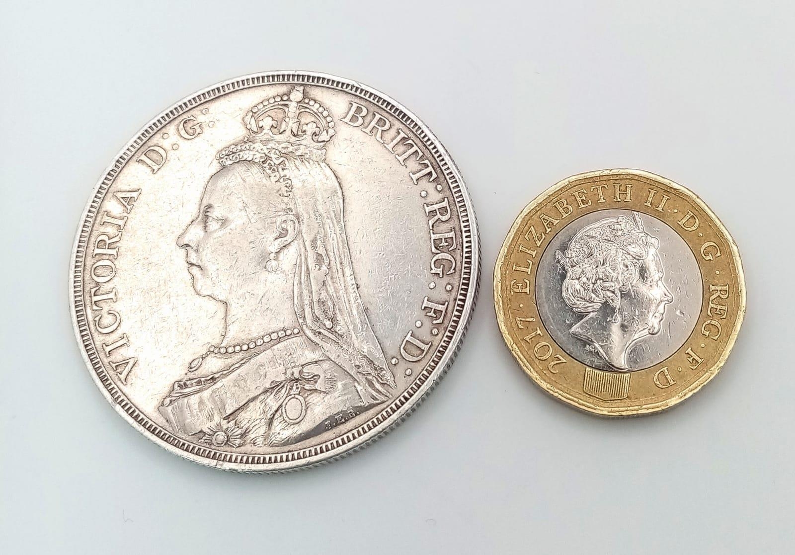An 1887 Queen Victoria Silver Crown Coin. VF grade but please see photos. - Image 2 of 2