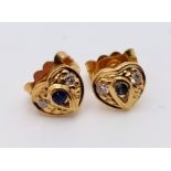 A Pair of 18K Gold Sapphire and Diamond Heart-Shaped Stud Earrings. 1.7g total weight. Ref: T1R