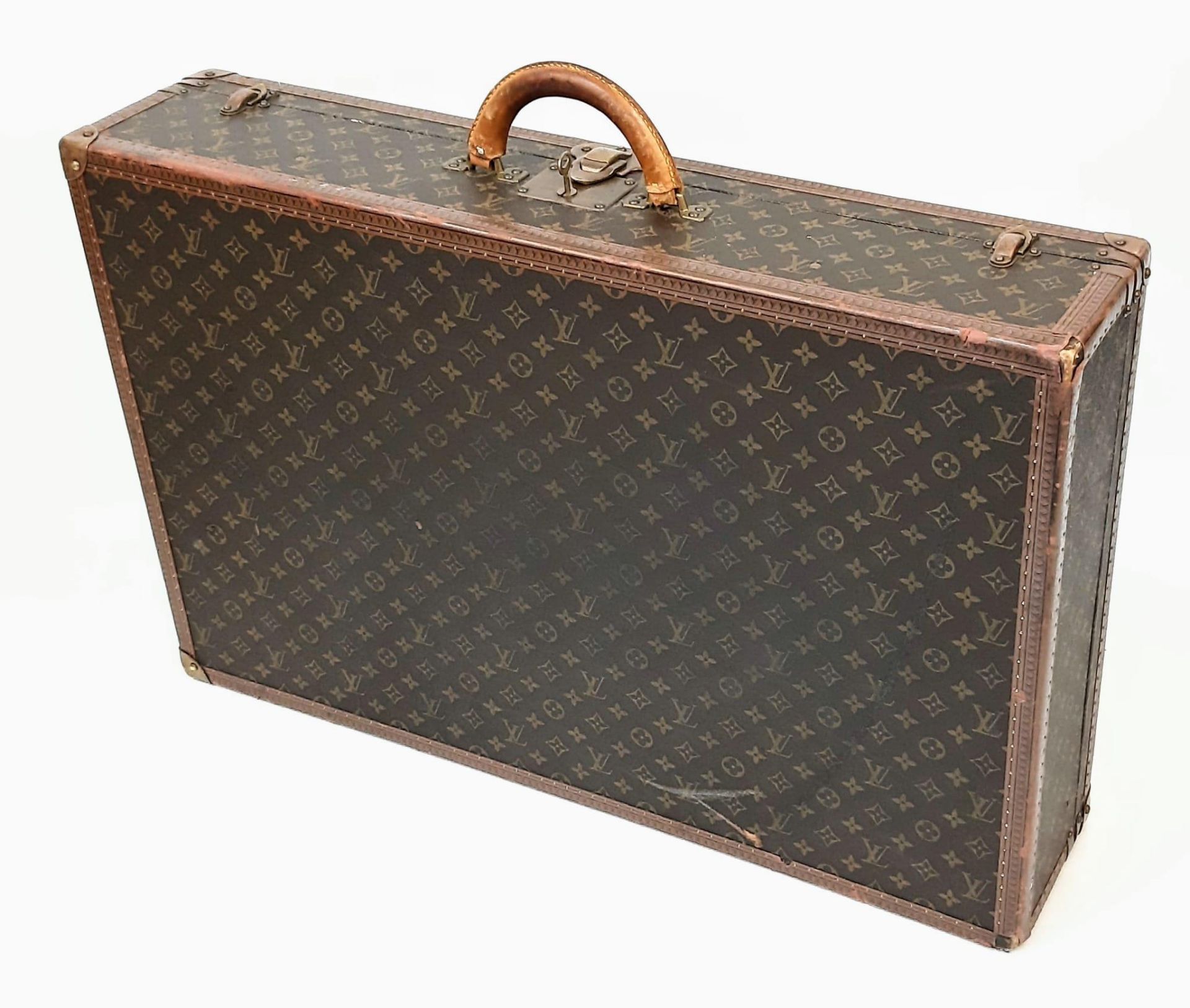 A Vintage Louis Vuitton Bisten 80 Trunk. Famous Monogram Leather With Gold Tone Hardware. Size