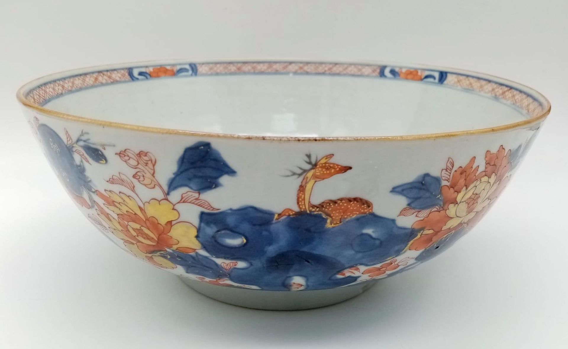 AN 18TH CENTURY CHINESE EXPORT LARGE BOWL, DECORATED IN THE YONGZHENG PERIOD WITH BRANCHES AND