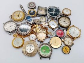 18 Watch Cases with Movements PLUS Nine Loose Watch Movements. Great for spare parts.