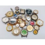 18 Watch Cases with Movements PLUS Nine Loose Watch Movements. Great for spare parts.