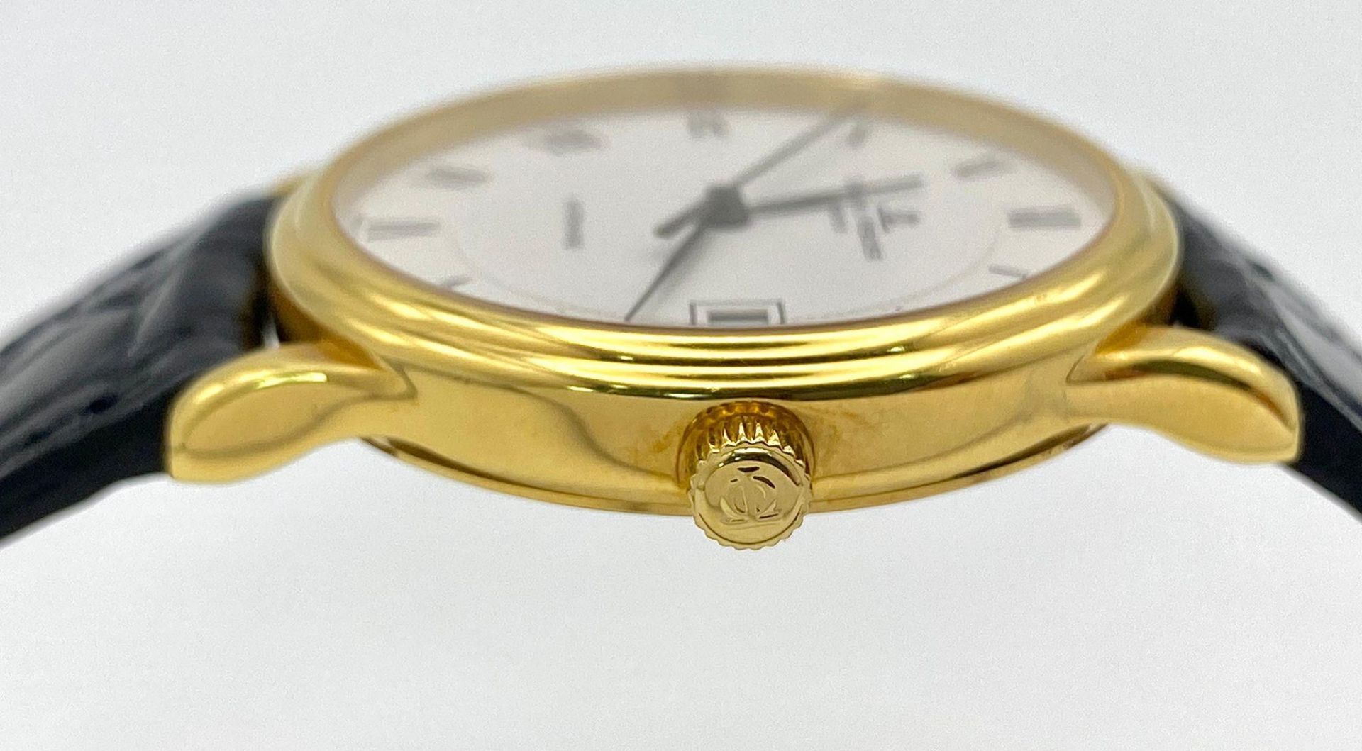 A Baume and Mercier 18K Gold Cased Automatic Gents Watch. Model - MV045075. Black leather strap. 18k - Bild 10 aus 21